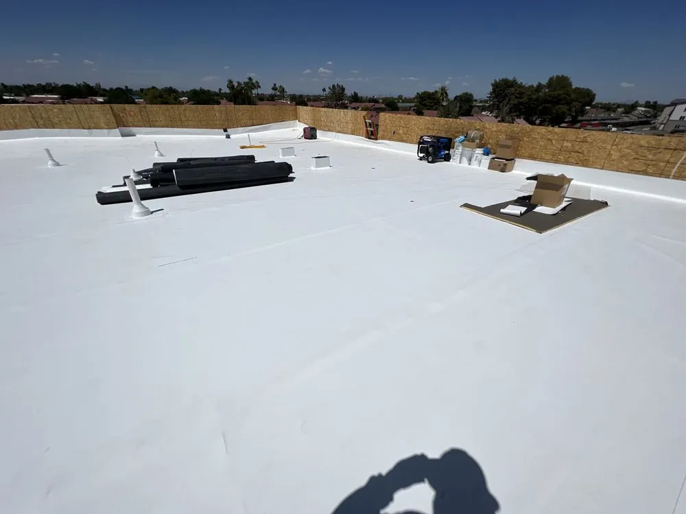 Slide of Raptor Roofing And Construction