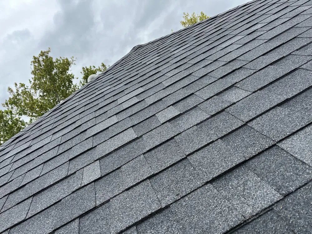 Slide of Rapturous Roofing & Construction