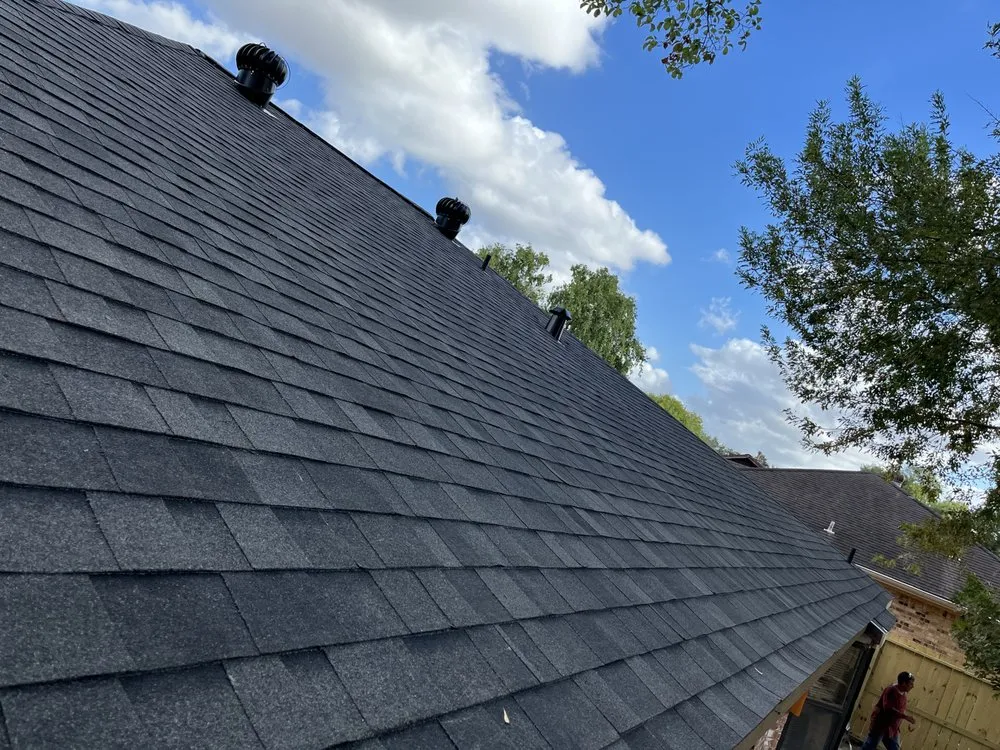 Slide of Rapturous Roofing & Construction