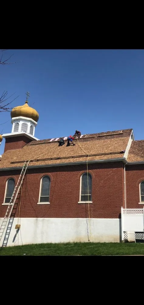 Slide of Rashids Roofing