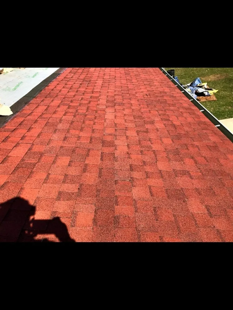 Slide of Rashids Roofing