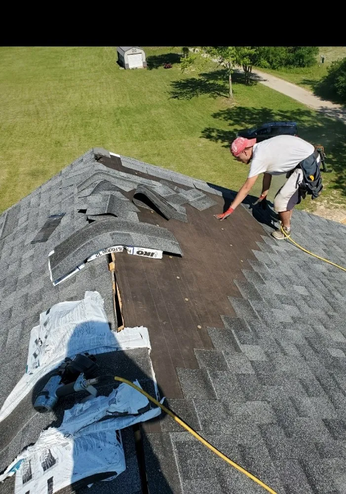 Slide of Rashids Roofing