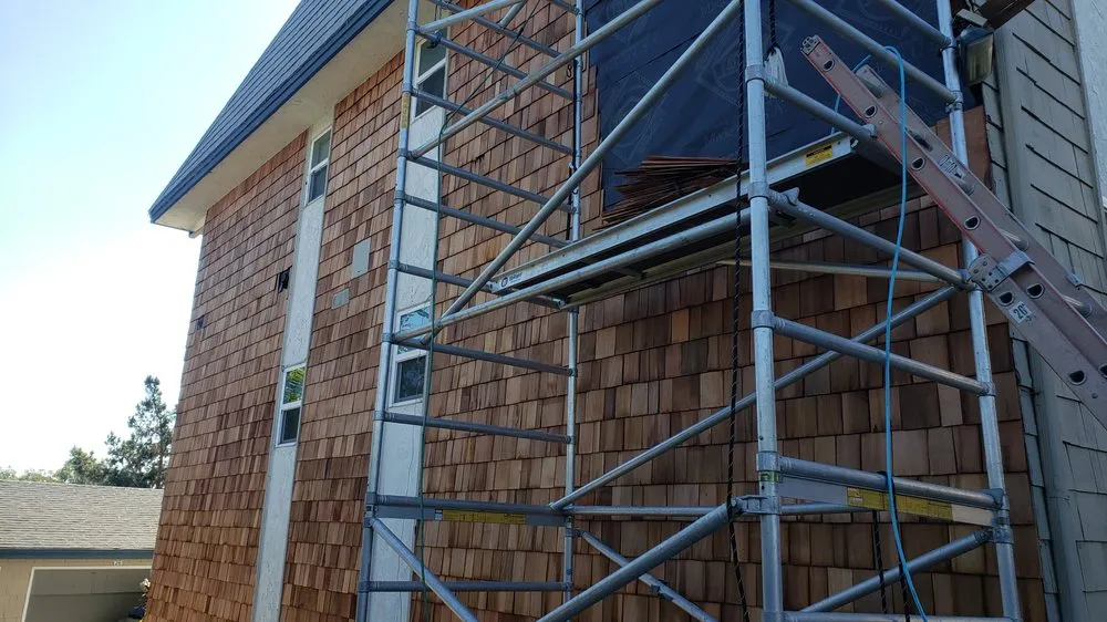 Slide of Rational Roofing Services