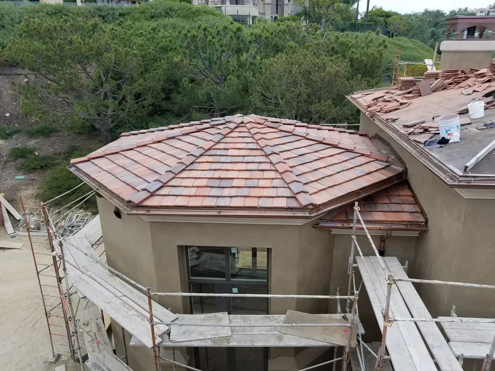 Slide of Rational Roofing Services