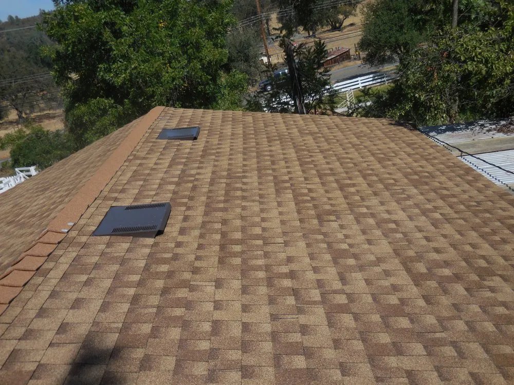 Slide of Rau Roofing