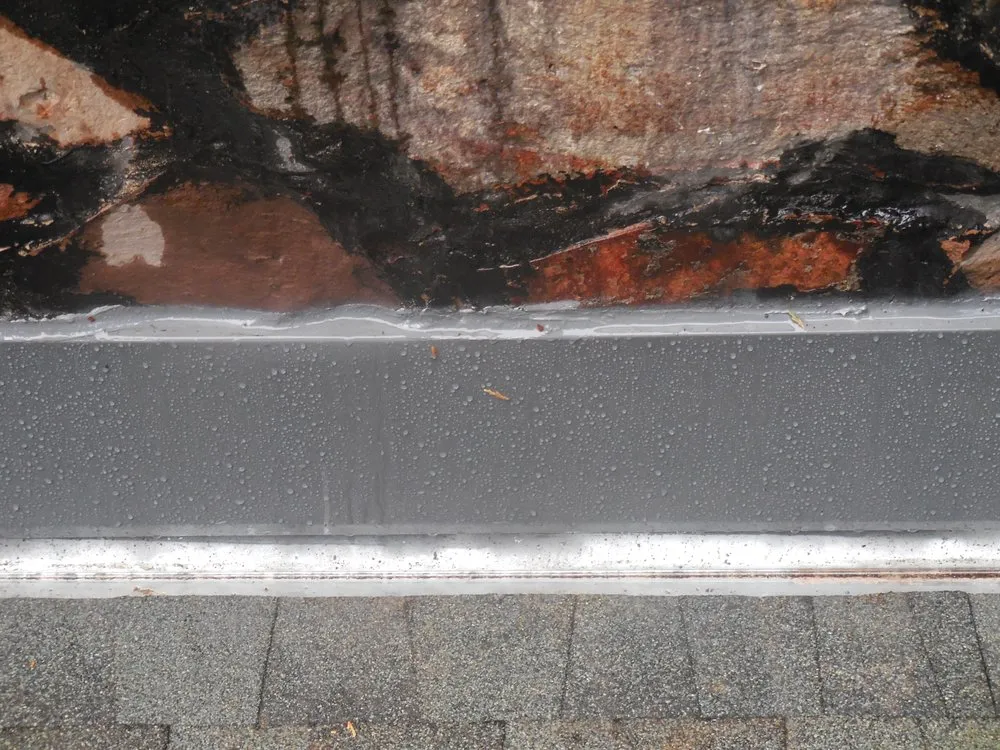 Slide of Rau Roofing