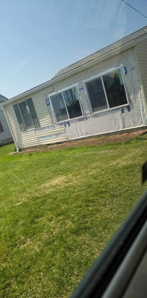 Slide of Rauch Roofing