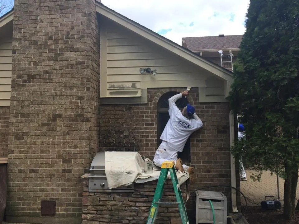 Slide of Ravlin's Roofing