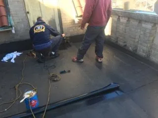 Slide of Rawson & Sons Roofing