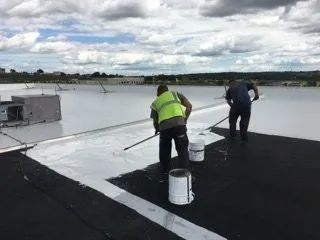 Slide of Rawson & Sons Roofing