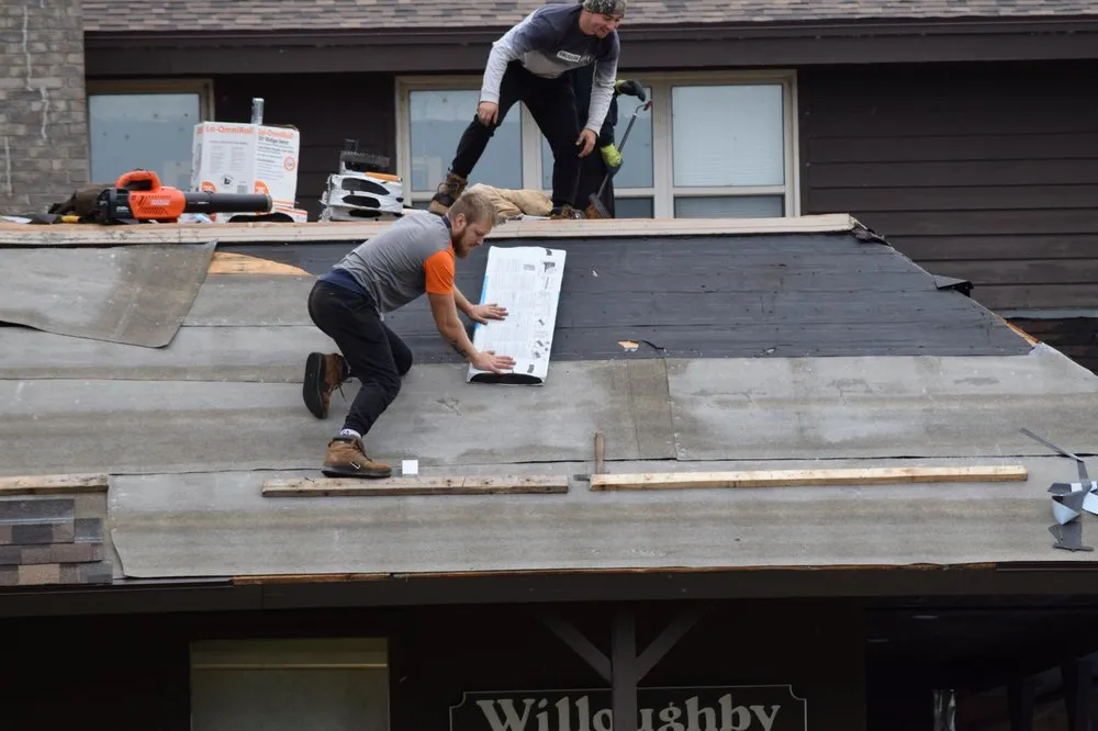 Slide of Rawson's Roofing