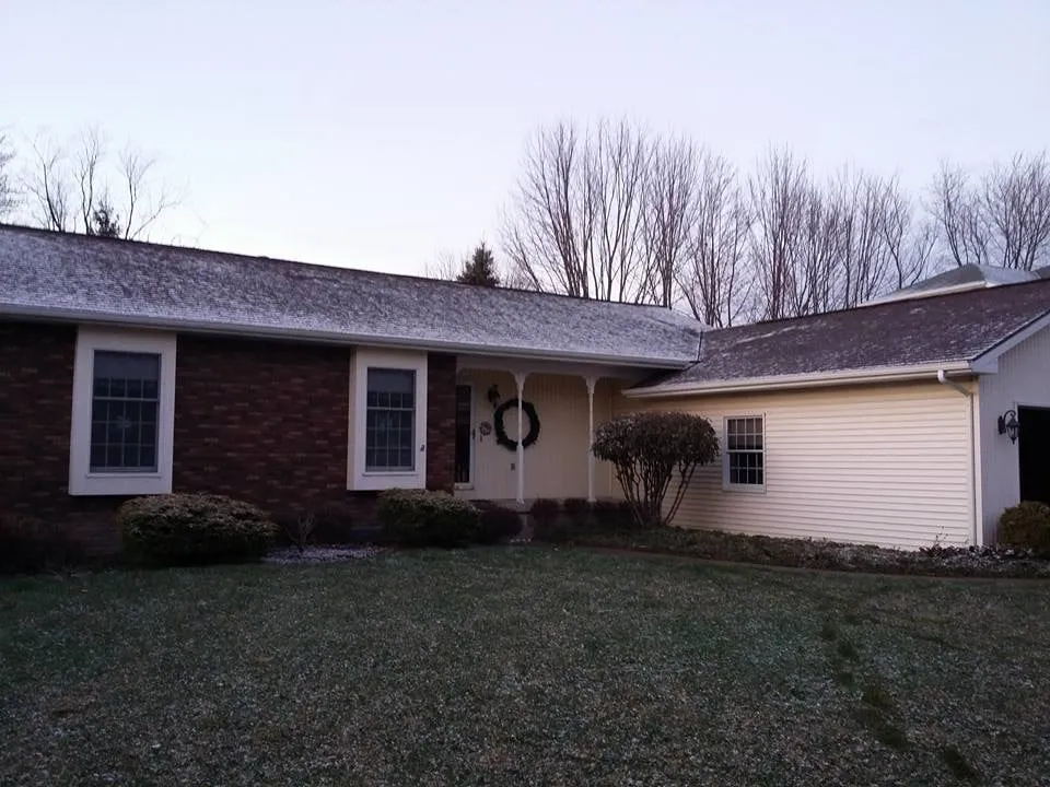 Slide of Rawson's Roofing