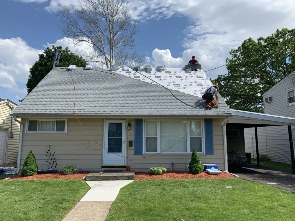 Slide of Ray Roofing