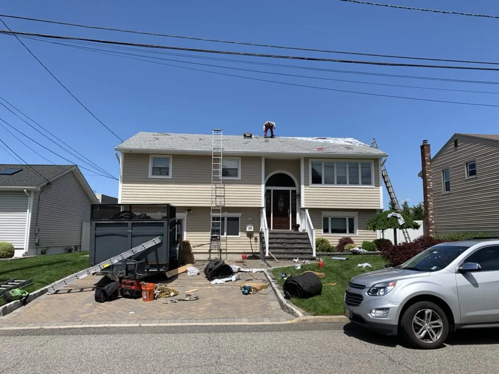 Slide of Ray Roofing