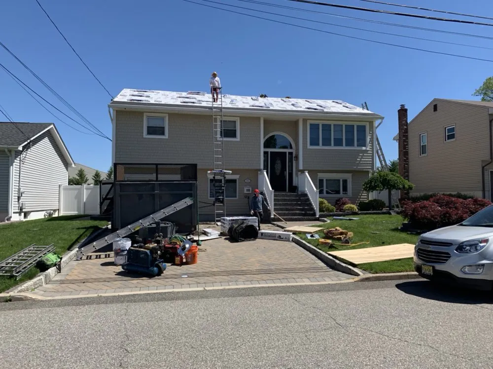 Slide of Ray Roofing