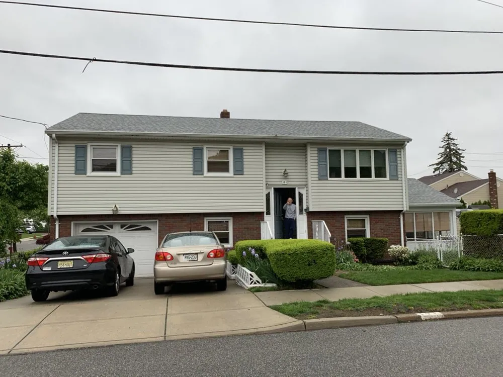 Slide of Ray Roofing