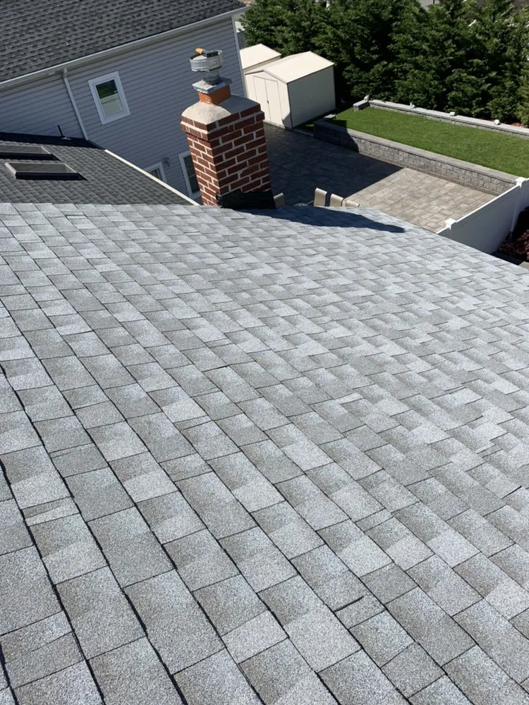 Slide of Ray Roofing