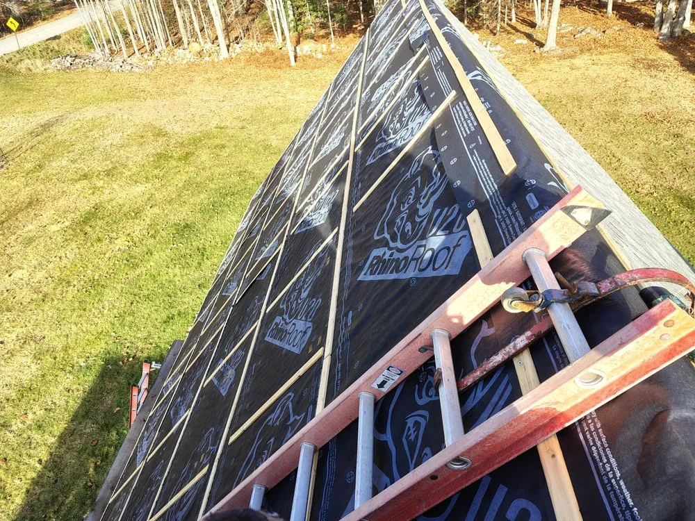 Slide of Raymonds Roofing & Construction