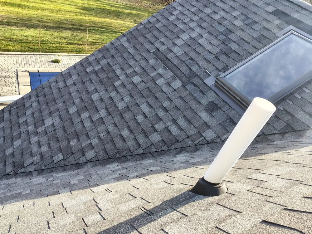 Slide of Raymonds Roofing & Construction