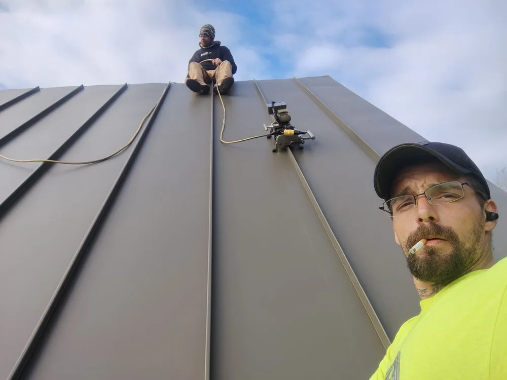 Slide of Raymonds Roofing & Construction