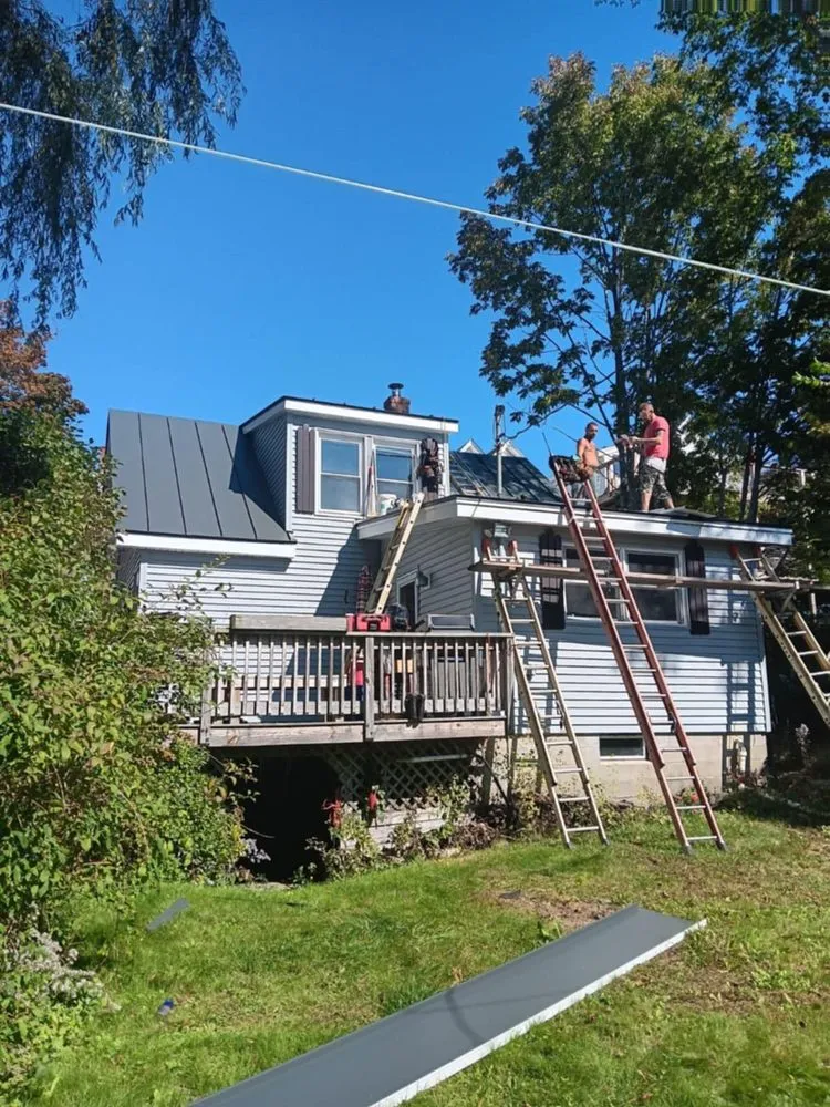 Slide of Raymonds Roofing & Construction