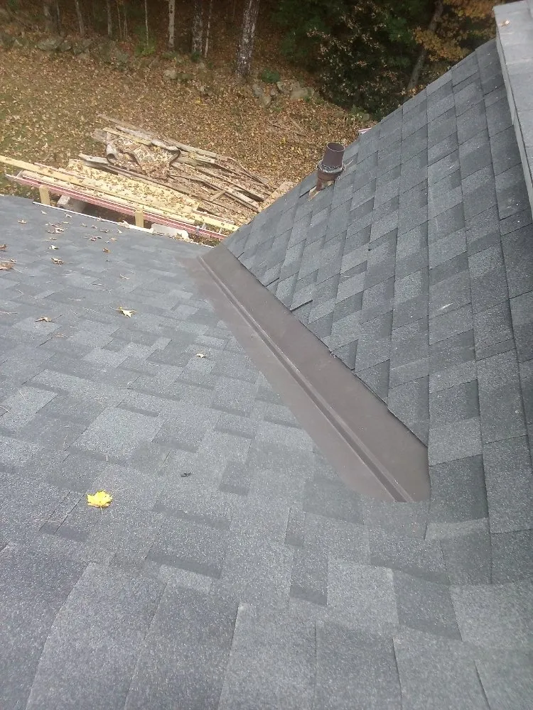Slide of Rayn Drop Roofing
