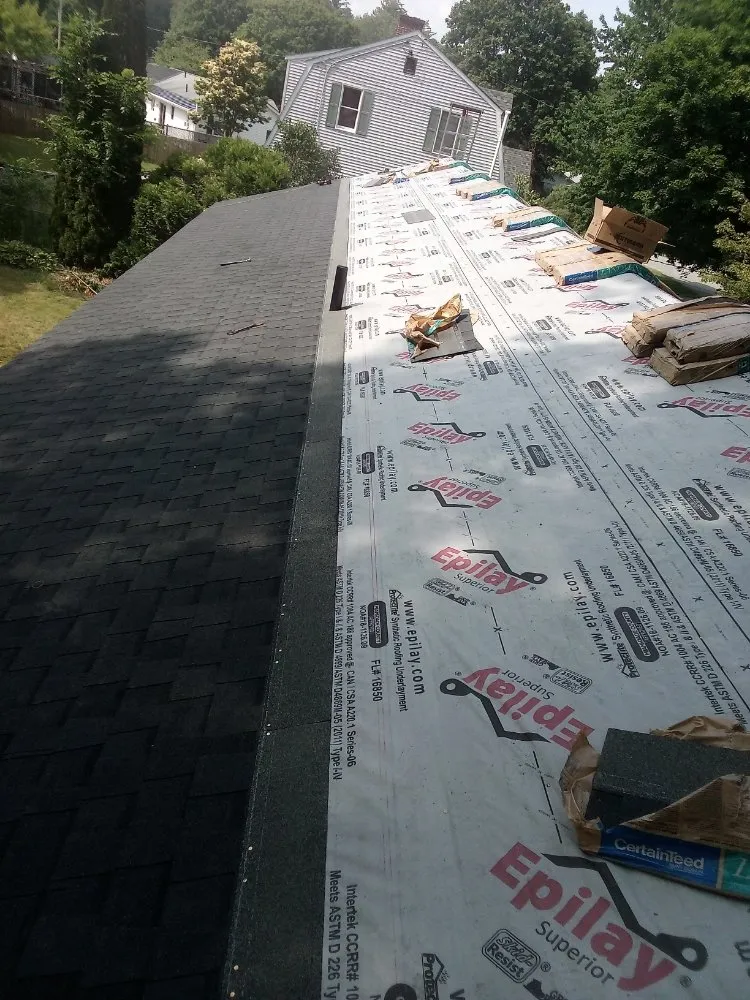 Slide of Rayn Drop Roofing