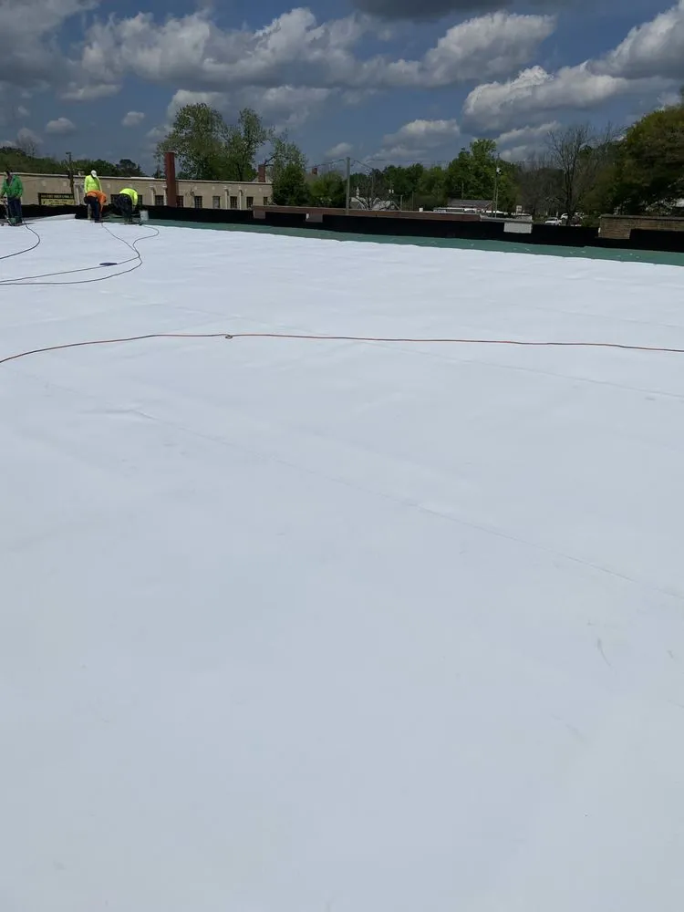 Slide of Ray’s Commercial Roofing Construction