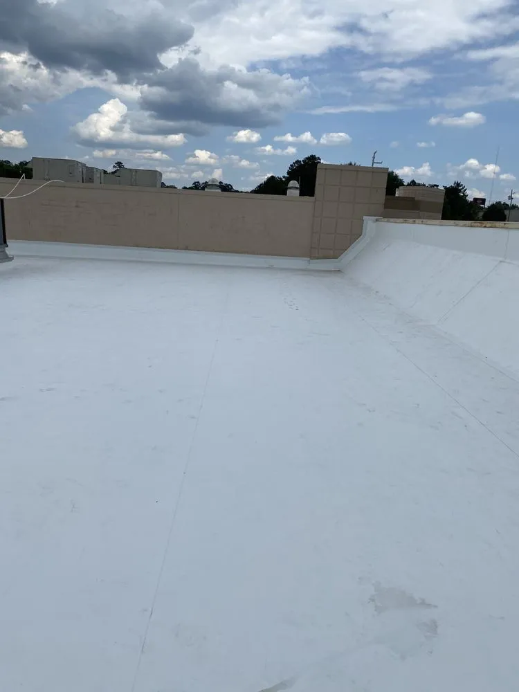 Slide of Ray’s Commercial Roofing Construction