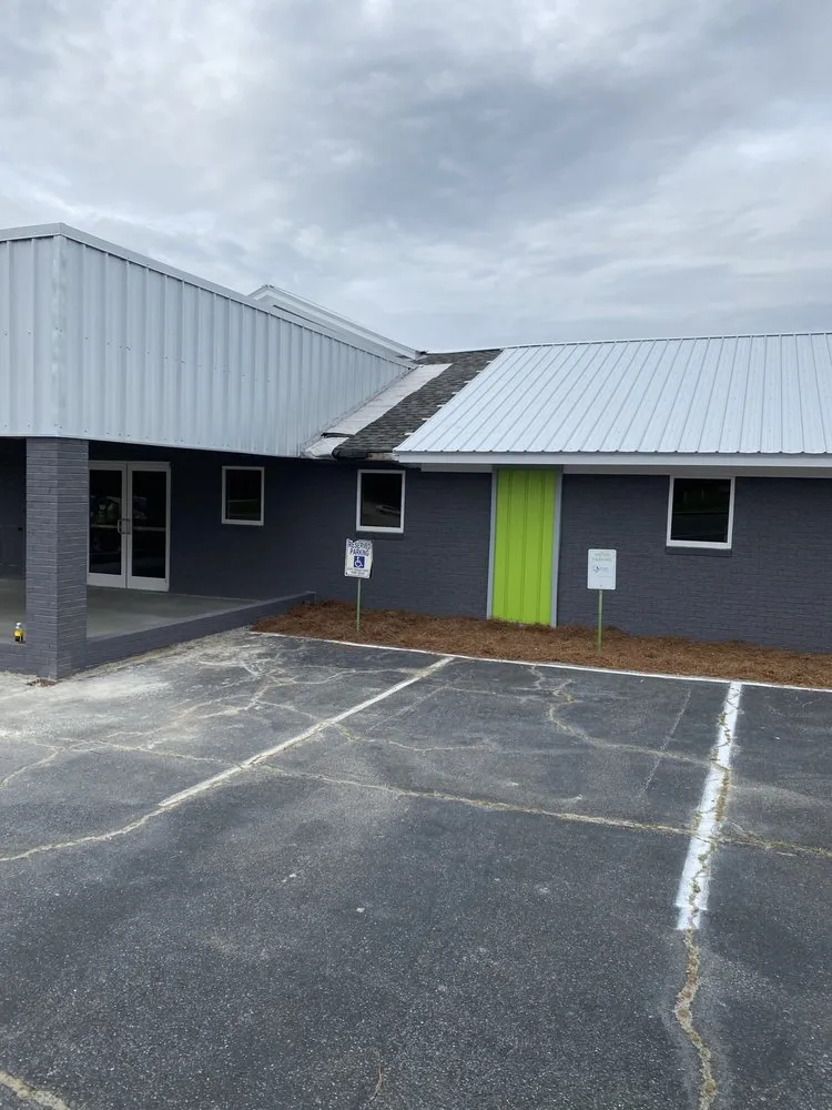 Slide of Ray’s Commercial Roofing Construction