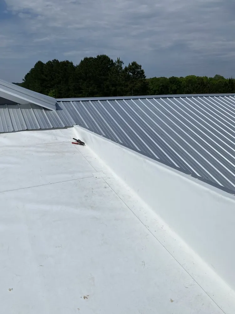 Slide of Ray’s Commercial Roofing Construction