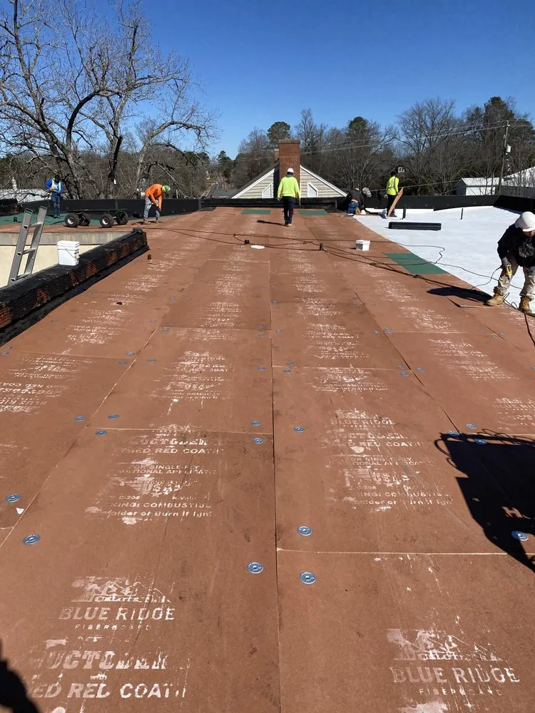 Slide of Ray’s Commercial Roofing Construction