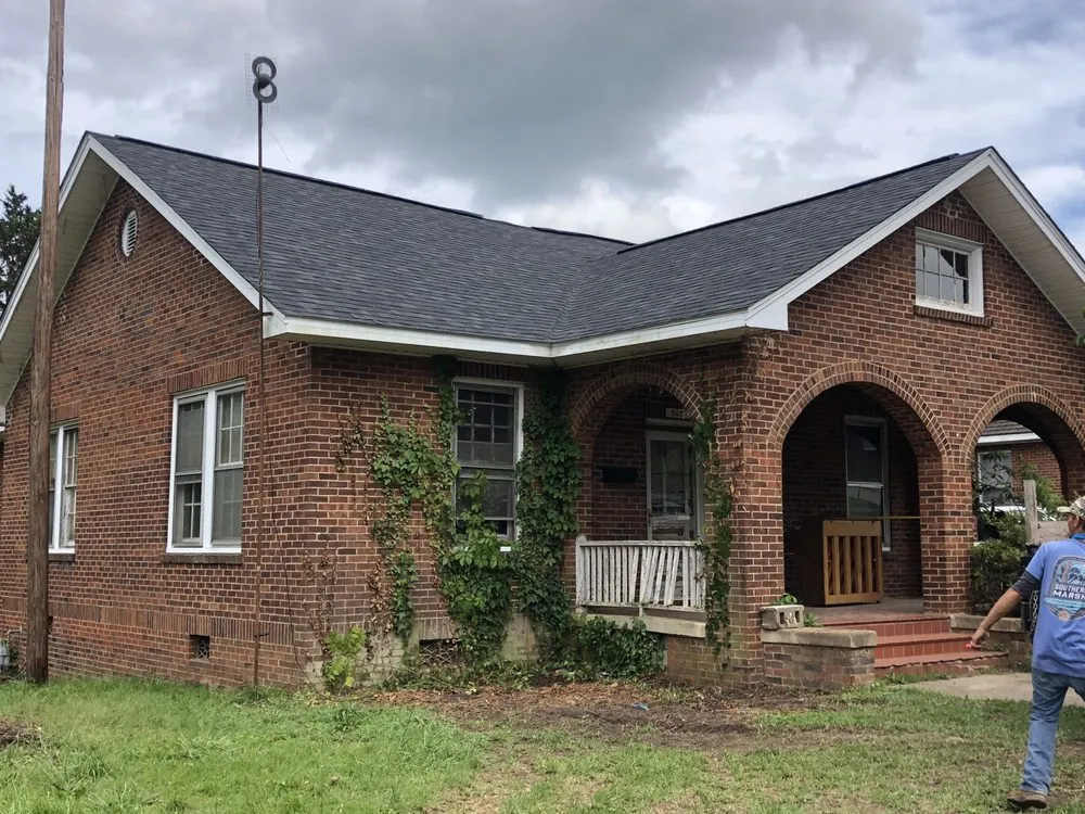 Slide of Ray's Roofing & Restoration