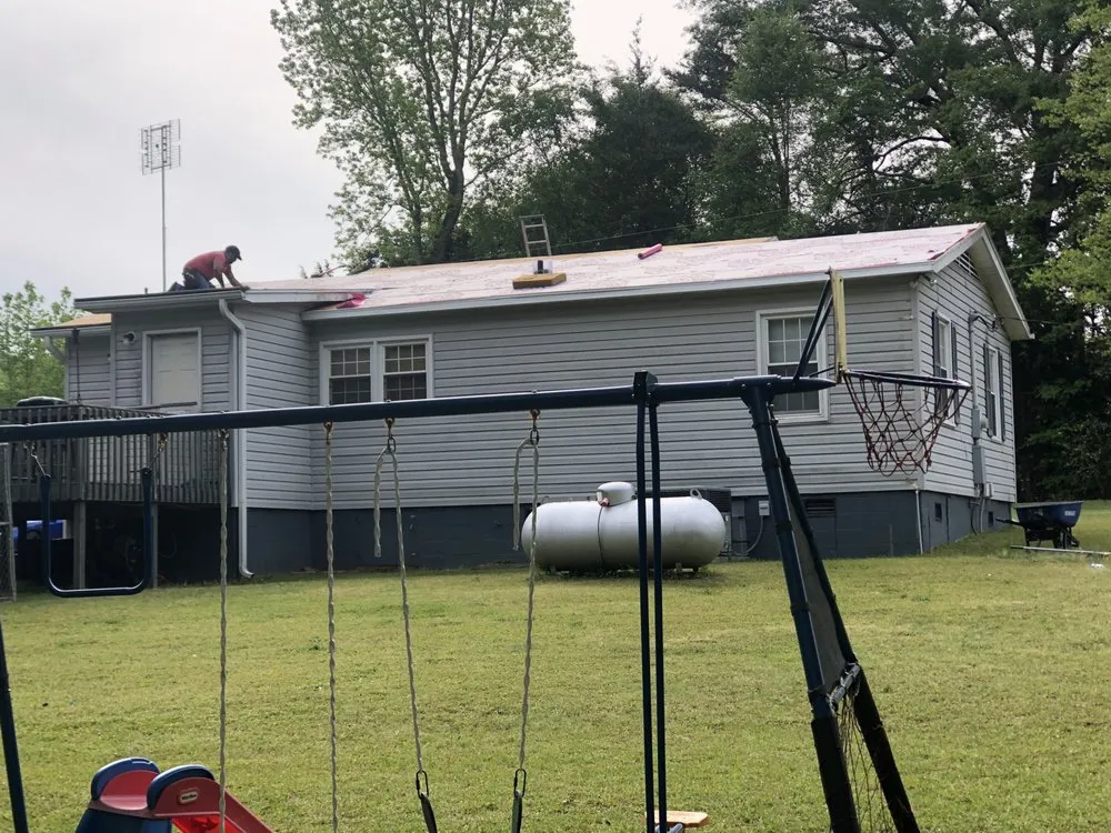 Slide of Ray's Roofing & Restoration