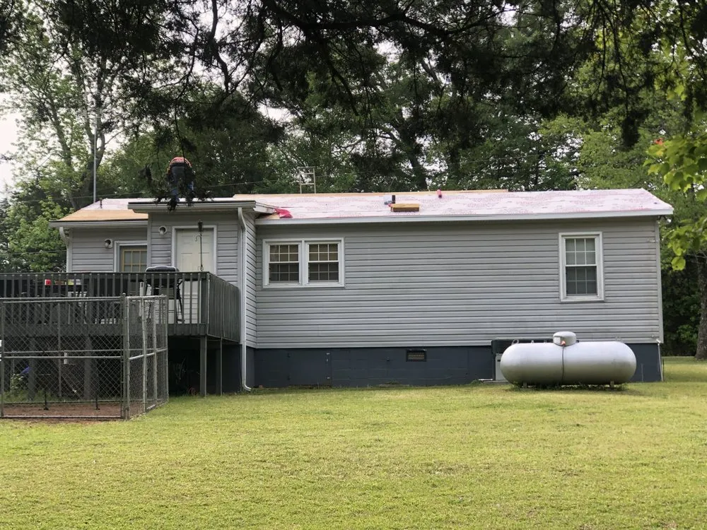 Slide of Ray's Roofing & Restoration