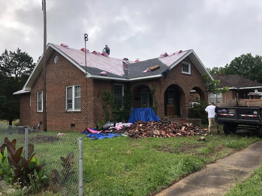 Slide of Ray's Roofing & Restoration