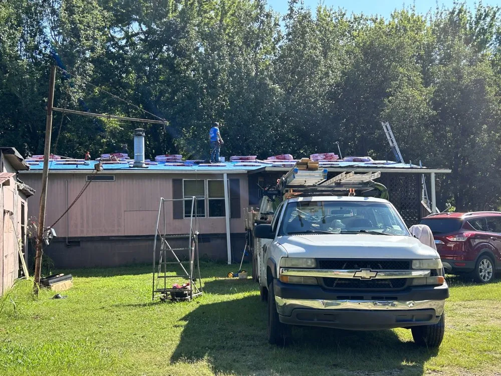 Slide of Ray's Roofing & Restoration