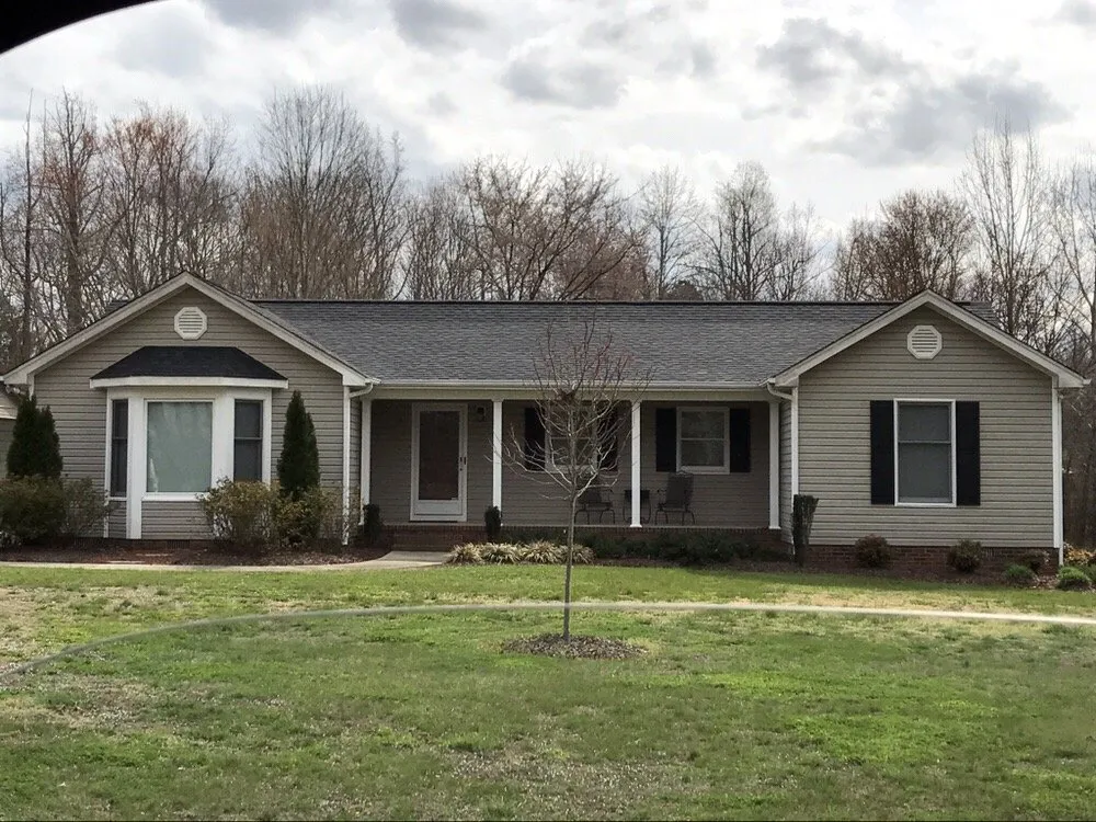 Slide of Ray's Roofing