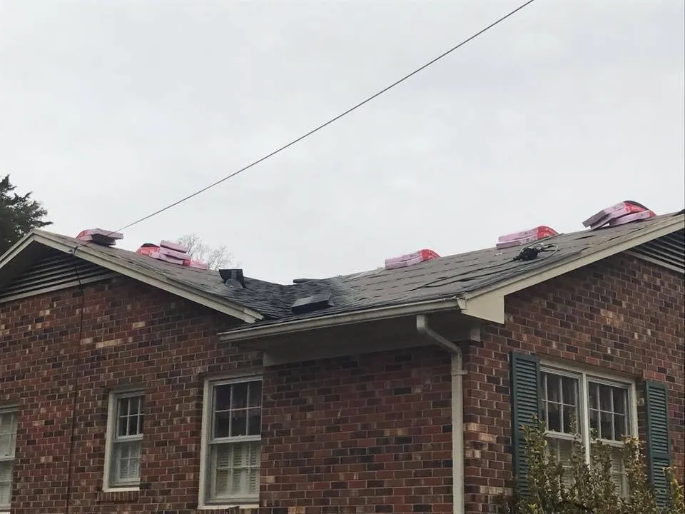 Slide of Ray's Roofing