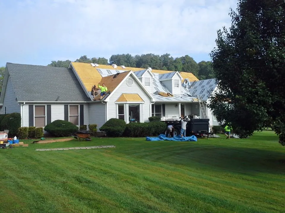 Slide of Ray's Roofing