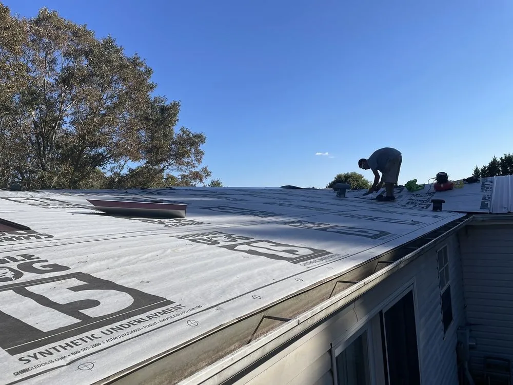 Slide of Ray’s Roofing Restoration And More