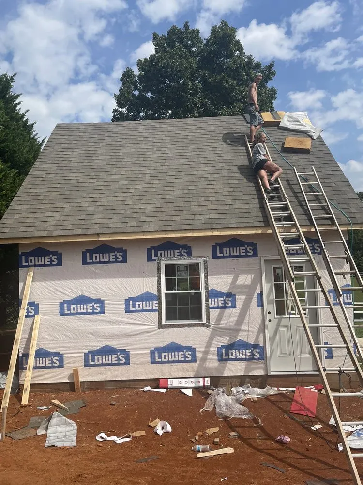 Slide of Ray’s Roofing Restoration And More