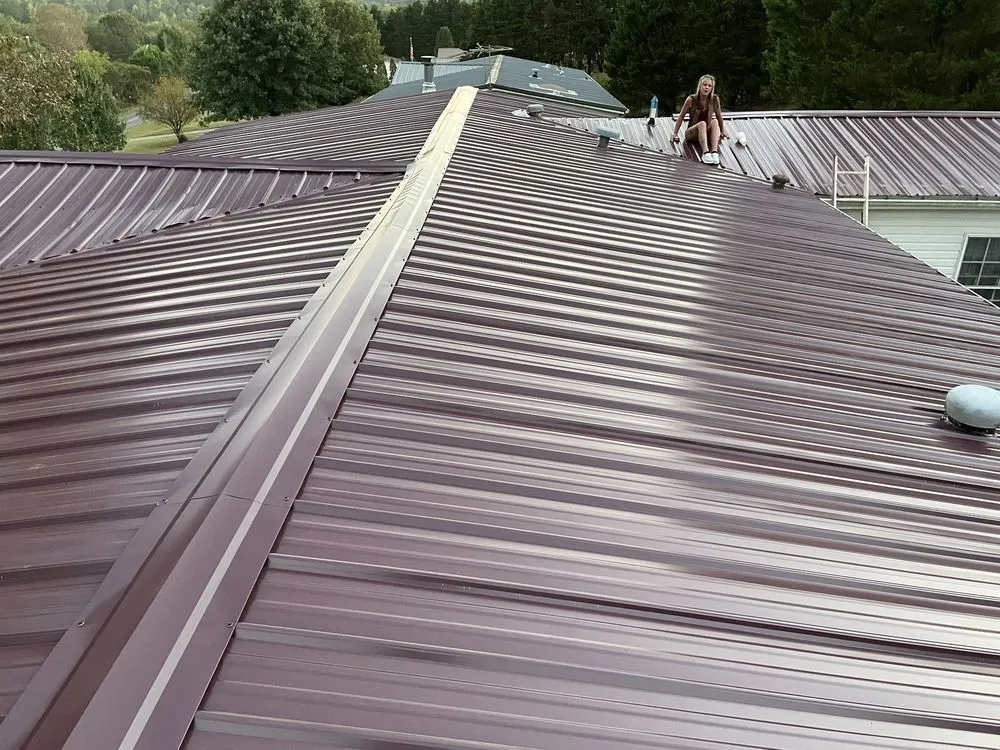 Slide of Ray’s Roofing Restoration And More