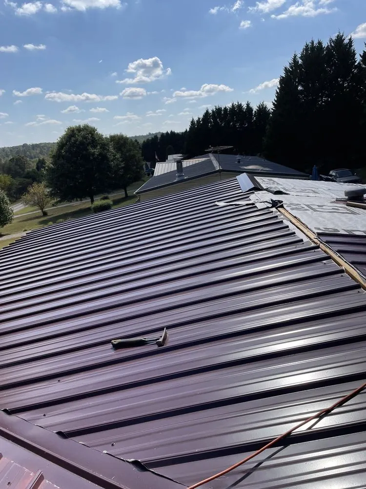 Slide of Ray’s Roofing Restoration And More