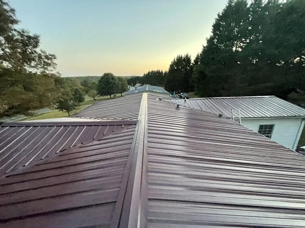 Slide of Ray’s Roofing Restoration And More