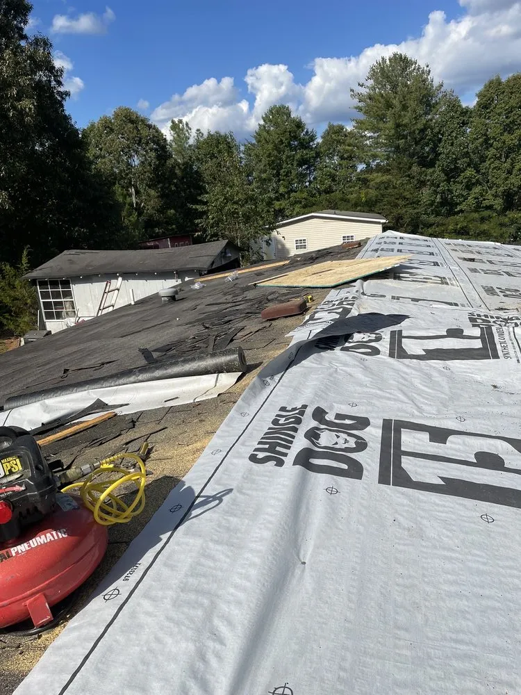 Slide of Ray’s Roofing Restoration And More