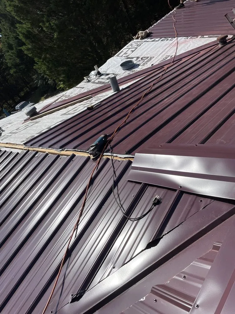 Slide of Ray’s Roofing Restoration And More