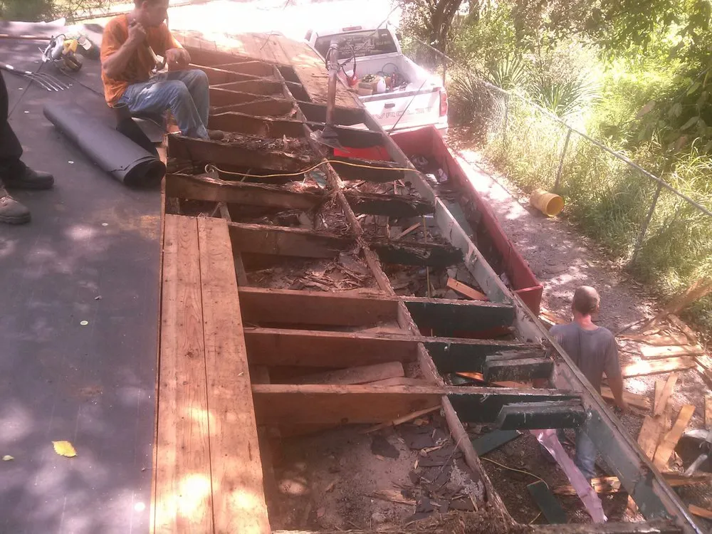 Slide of Ray's Roofing