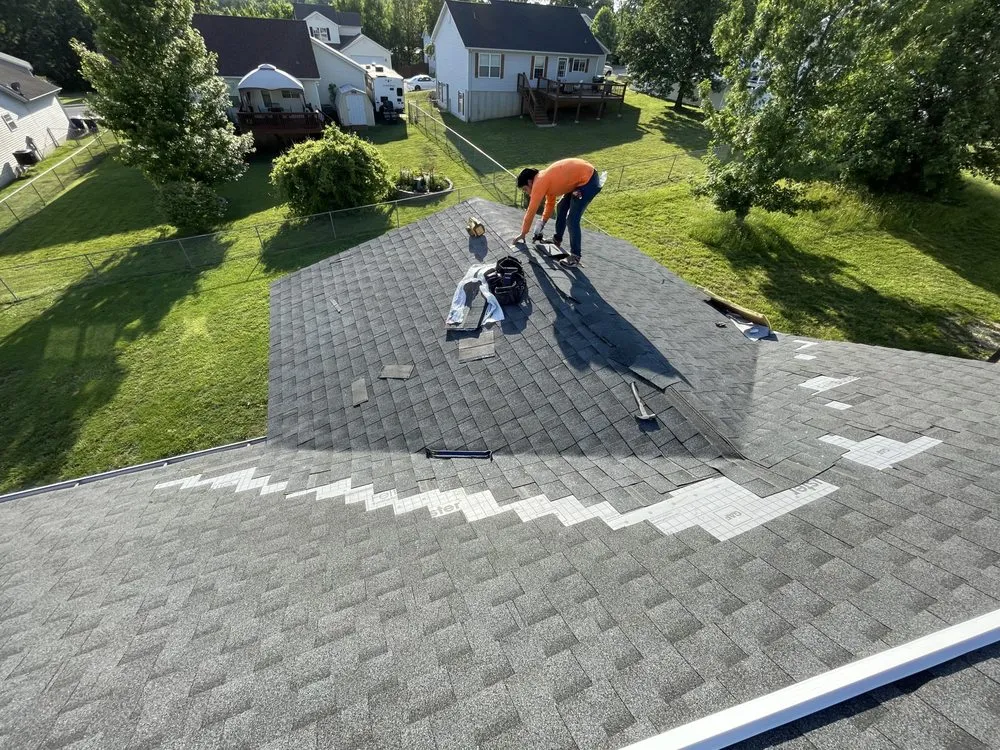 Slide of RC Roofing and Contracting