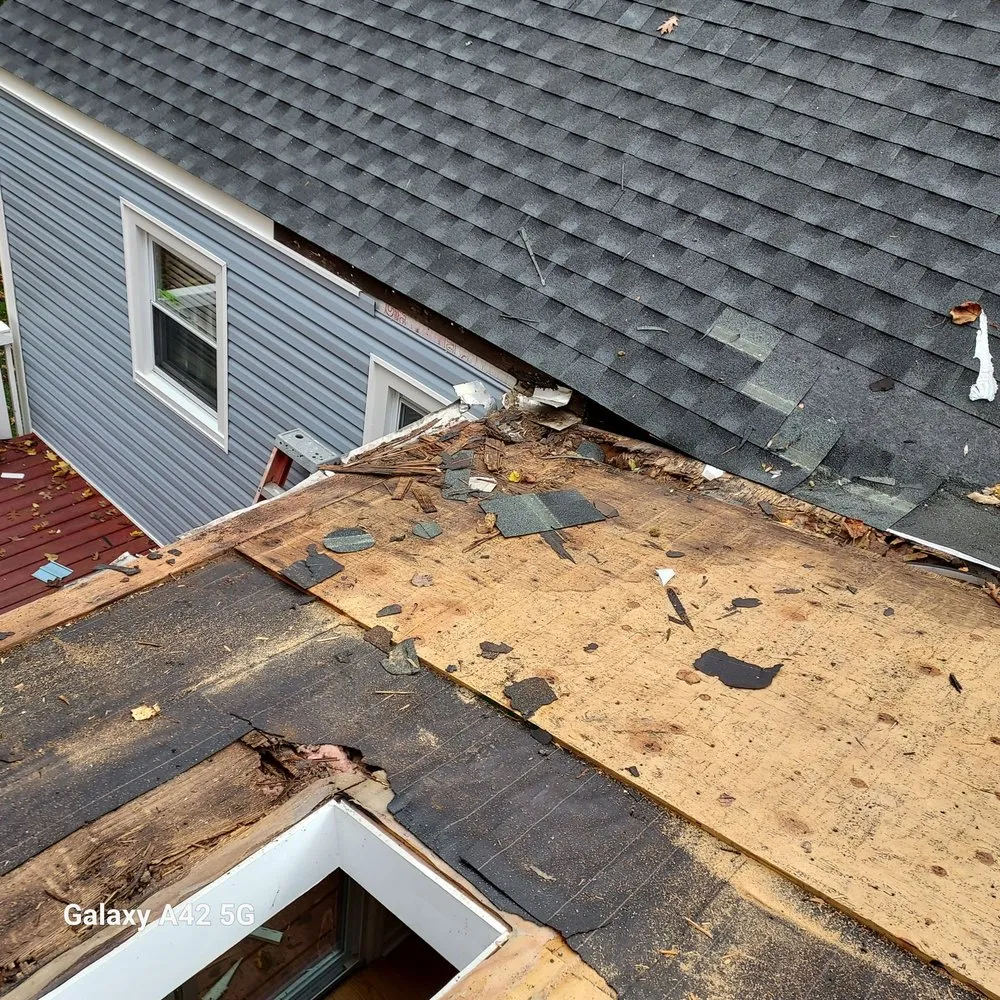 Slide of RC Roofing and Siding